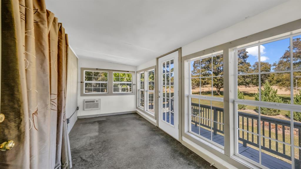 1240 Riverview Road Millsap, TX 76066 - Photo 14 of 36 a view of hallway with stairs and furniture