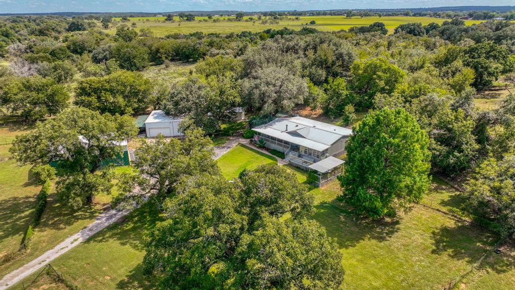 1240 Riverview Road Millsap, TX 76066 - Photo 2 of 36 a view of a yard with swimming pool