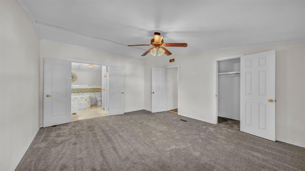 1240 Riverview Road Millsap, TX 76066 - Photo 28 of 36 a view of empty room with ceiling fan