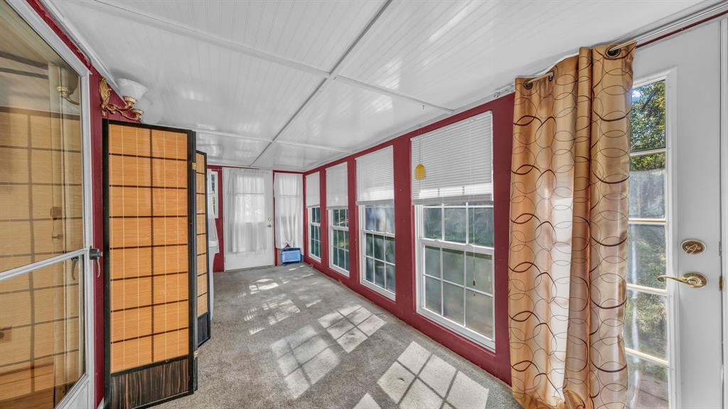 1240 Riverview Road Millsap, TX 76066 - Photo 35 of 36 a view of a large window with an outdoor space