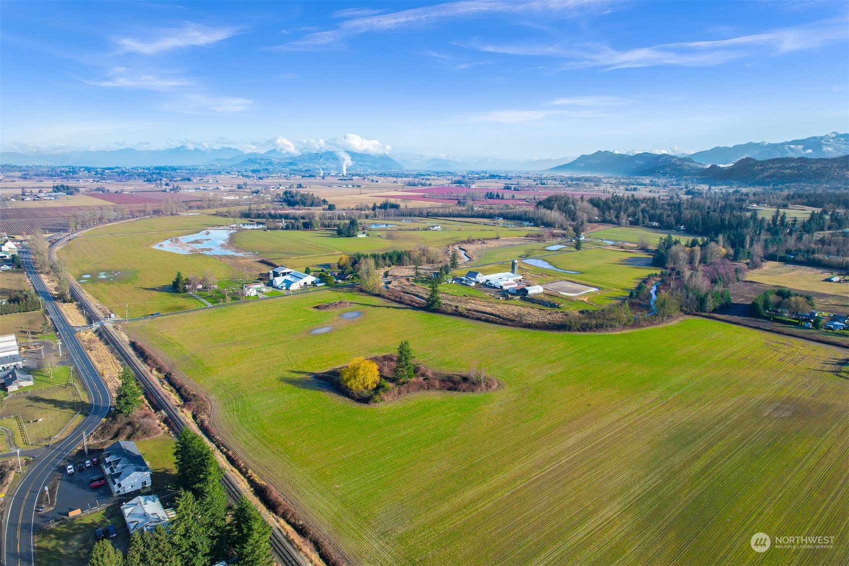 0 Alm Everson, WA 98247 - Photo 3 of 3 a view of a swimming pool with a table and chairs