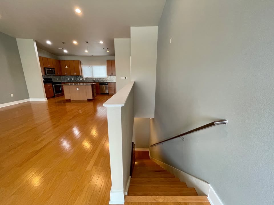1702 South Lamar Boulevard, Unit 2 Austin, TX 78704 - Photo 13 of 25 Stairway with wood finished floors and recessed lighting