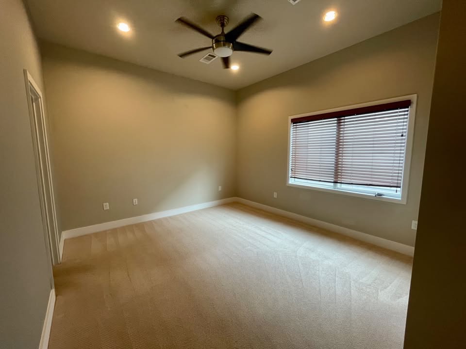 1702 South Lamar Boulevard, Unit 2 Austin, TX 78704 - Photo 14 of 25 Unfurnished room with ceiling fan, light carpet, and recessed lighting