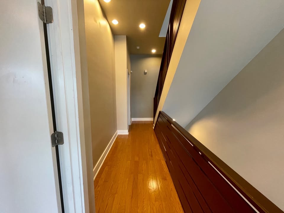 1702 South Lamar Boulevard, Unit 2 Austin, TX 78704 - Photo 21 of 25 Hall with light wood finished floors and recessed lighting