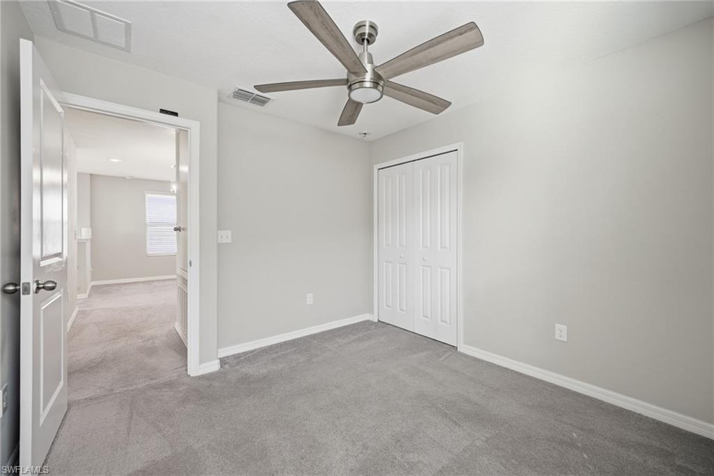9612 Lemon Drop Loop Sun City Center, FL 33573 - Photo 20 of 33 wooden floor in an empty room