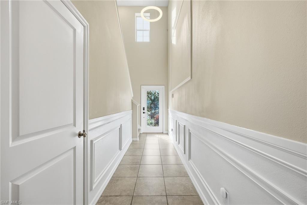 9612 Lemon Drop Loop Sun City Center, FL 33573 - Photo 29 of 33 a bathroom with a bathtub and shower