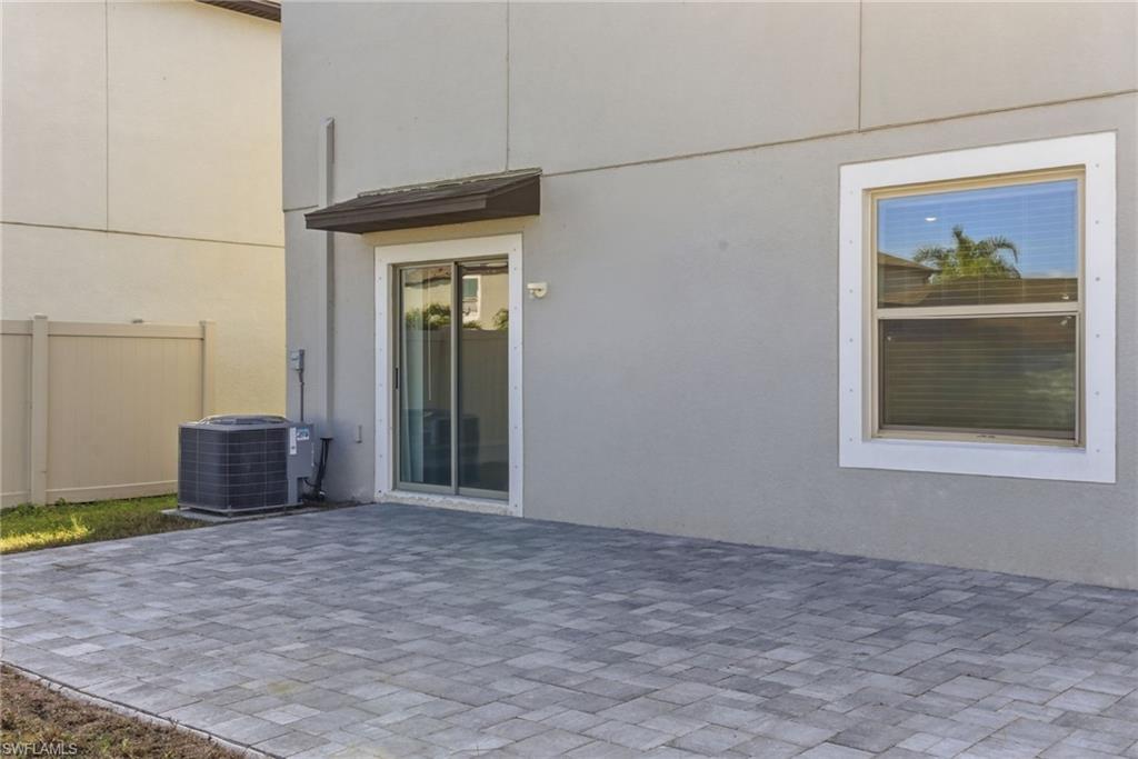 9612 Lemon Drop Loop Sun City Center, FL 33573 - Photo 30 of 33 a view of a room with a window