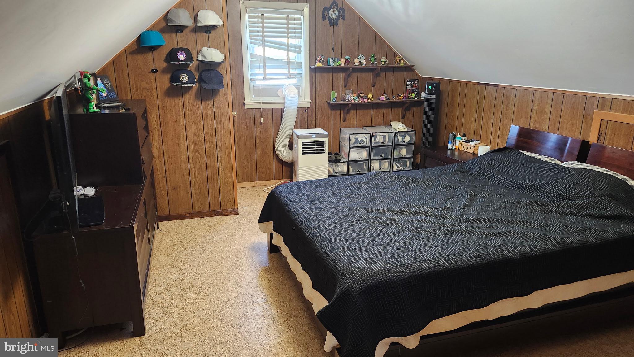 24 Forman Drive Hamilton, NJ 08690 - Photo 12 of 17 Cozy attic retreat with wooden accents.