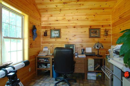 569 Sam Reed Road Northwest Floyd, VA 24091 - Photo 15 of 22 a view of a workspace with furniture and a window