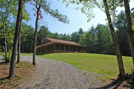 569 Sam Reed Road Northwest Floyd, VA 24091 - Photo 5 of 22 a view of a house with a backyard