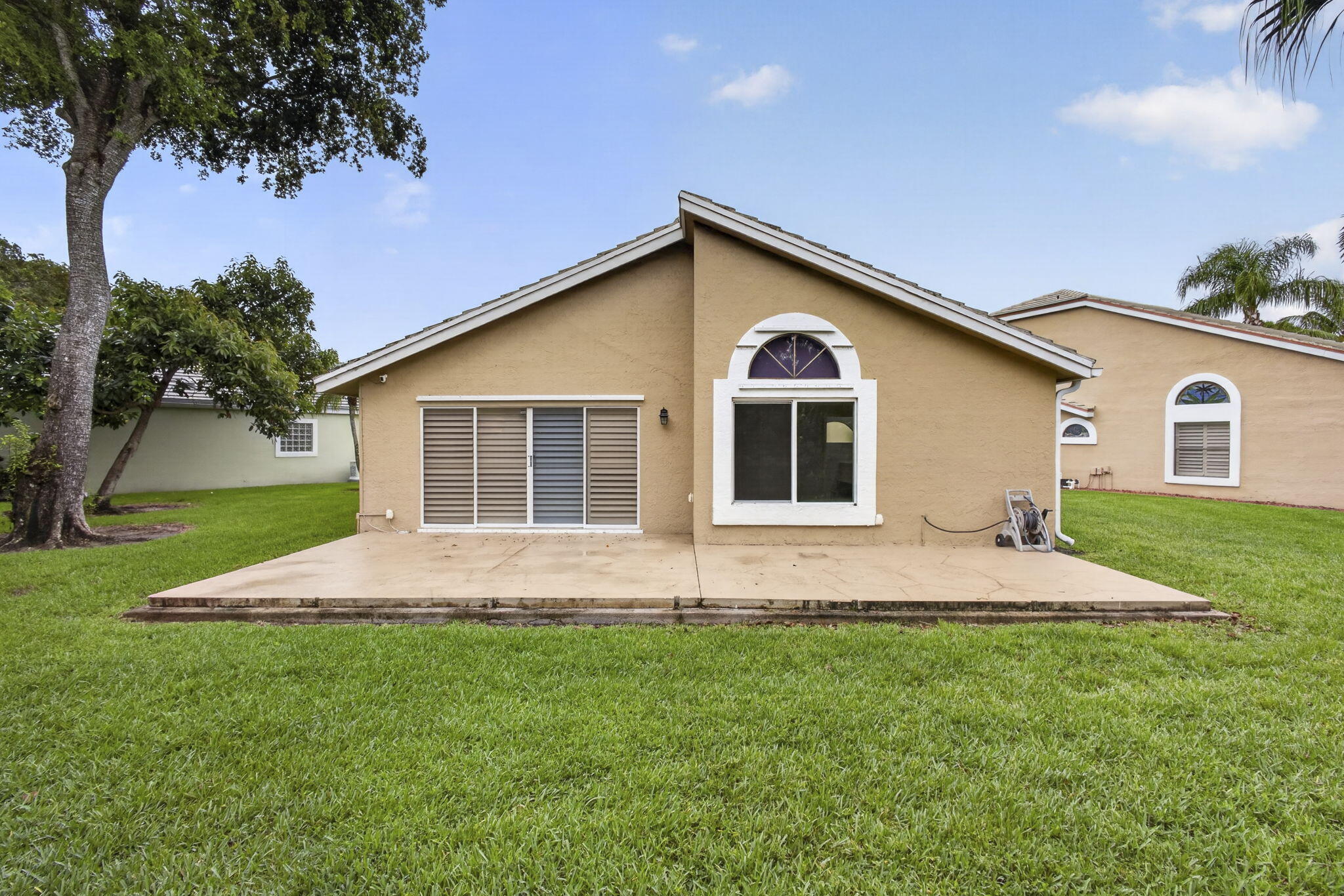 6064 Beaconwood Road Lake Worth, FL 33467 - Photo 32 of 42 Back exterior