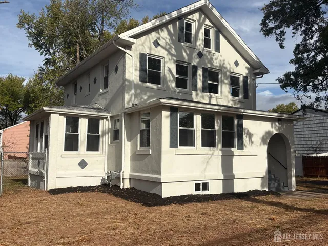 a front view of a large white building