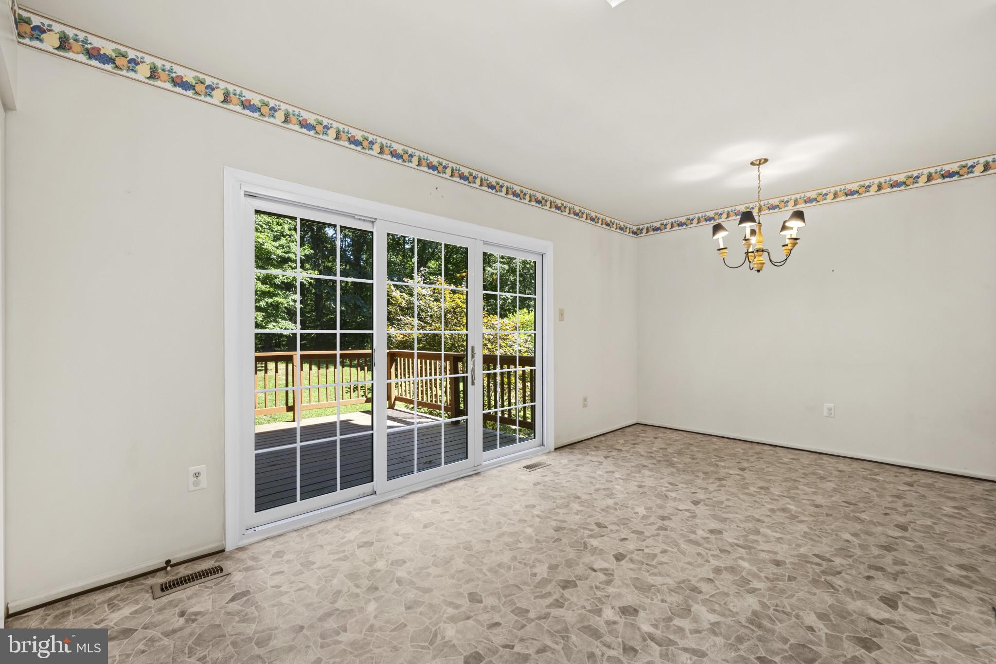 4031 Forest Valley Road Baltimore, MD 21234 - Photo 12 of 30 a view of an empty room with a window
