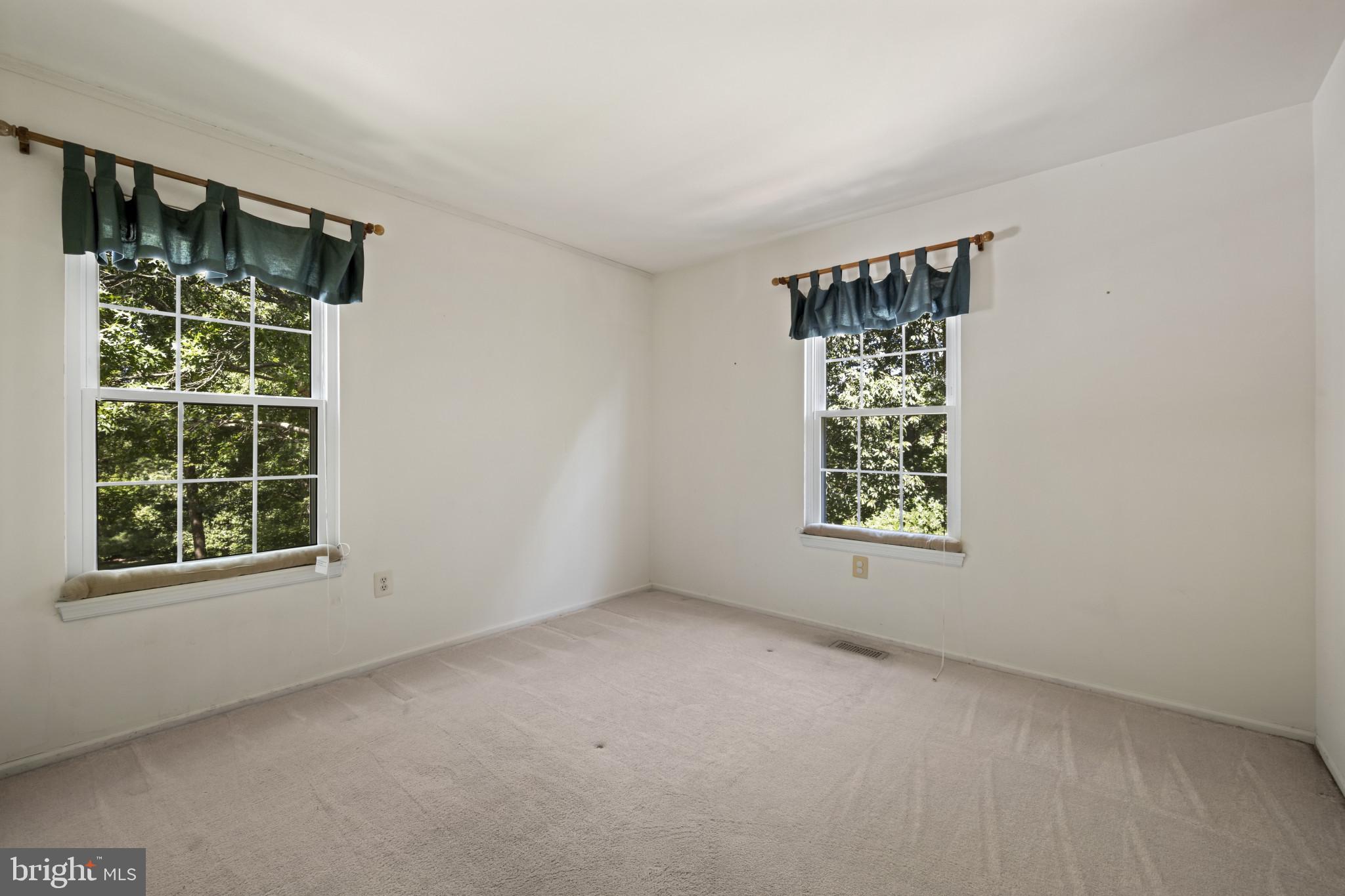 4031 Forest Valley Road Baltimore, MD 21234 - Photo 15 of 30 an empty room with a window