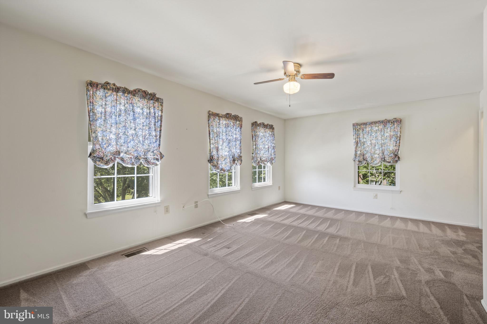 4031 Forest Valley Road Baltimore, MD 21234 - Photo 17 of 30 a view of an empty room with a window