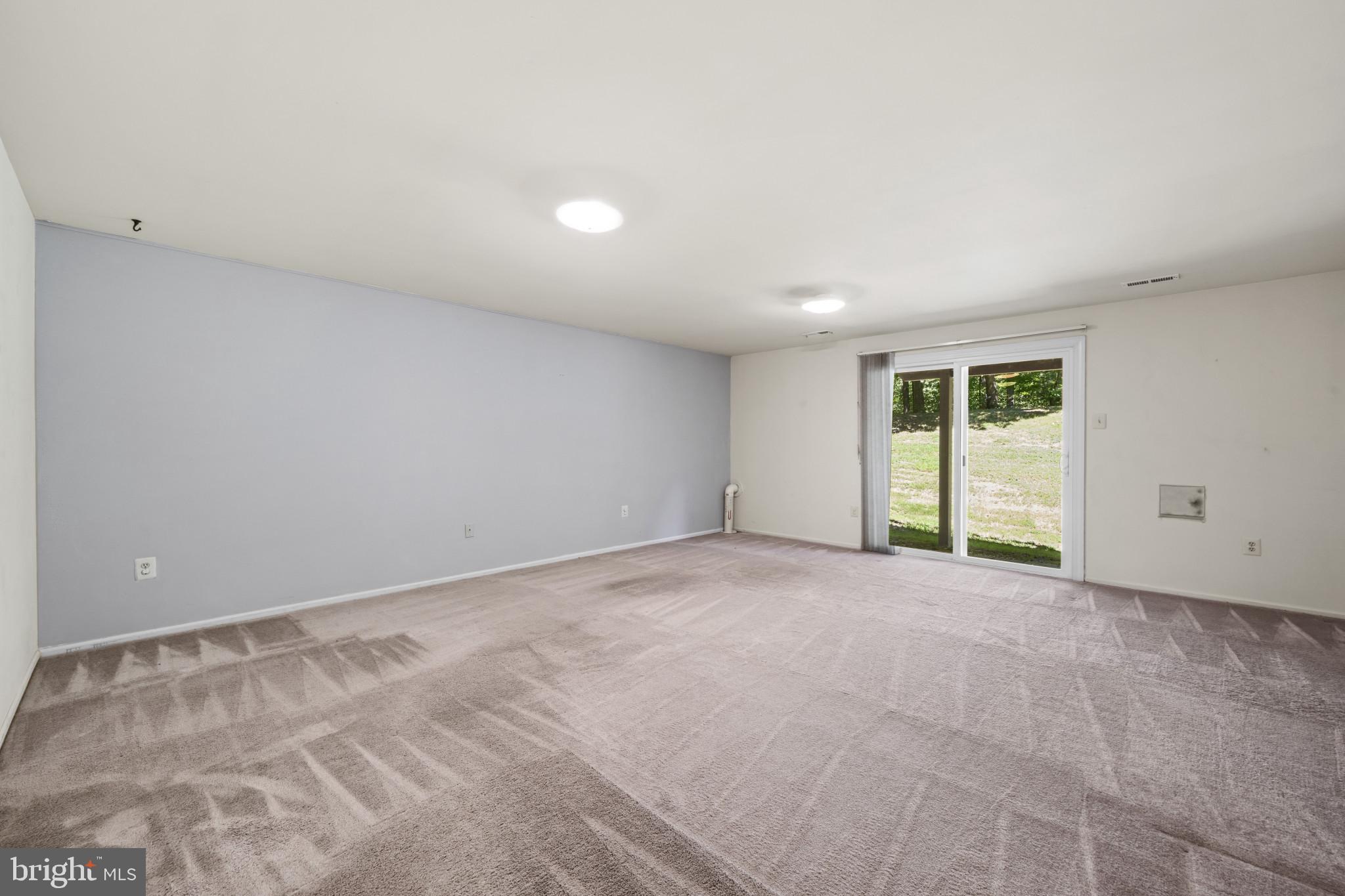 4031 Forest Valley Road Baltimore, MD 21234 - Photo 24 of 30 a view of an empty room with a window