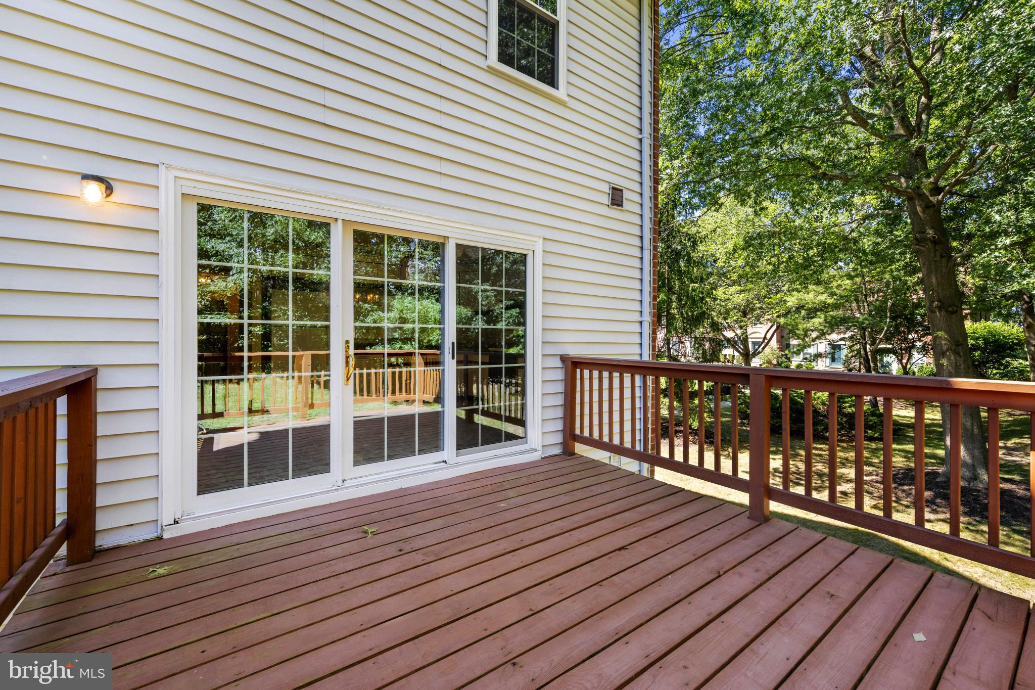 4031 Forest Valley Road Baltimore, MD 21234 - Photo 30 of 30 a view of a balcony with wooden floor