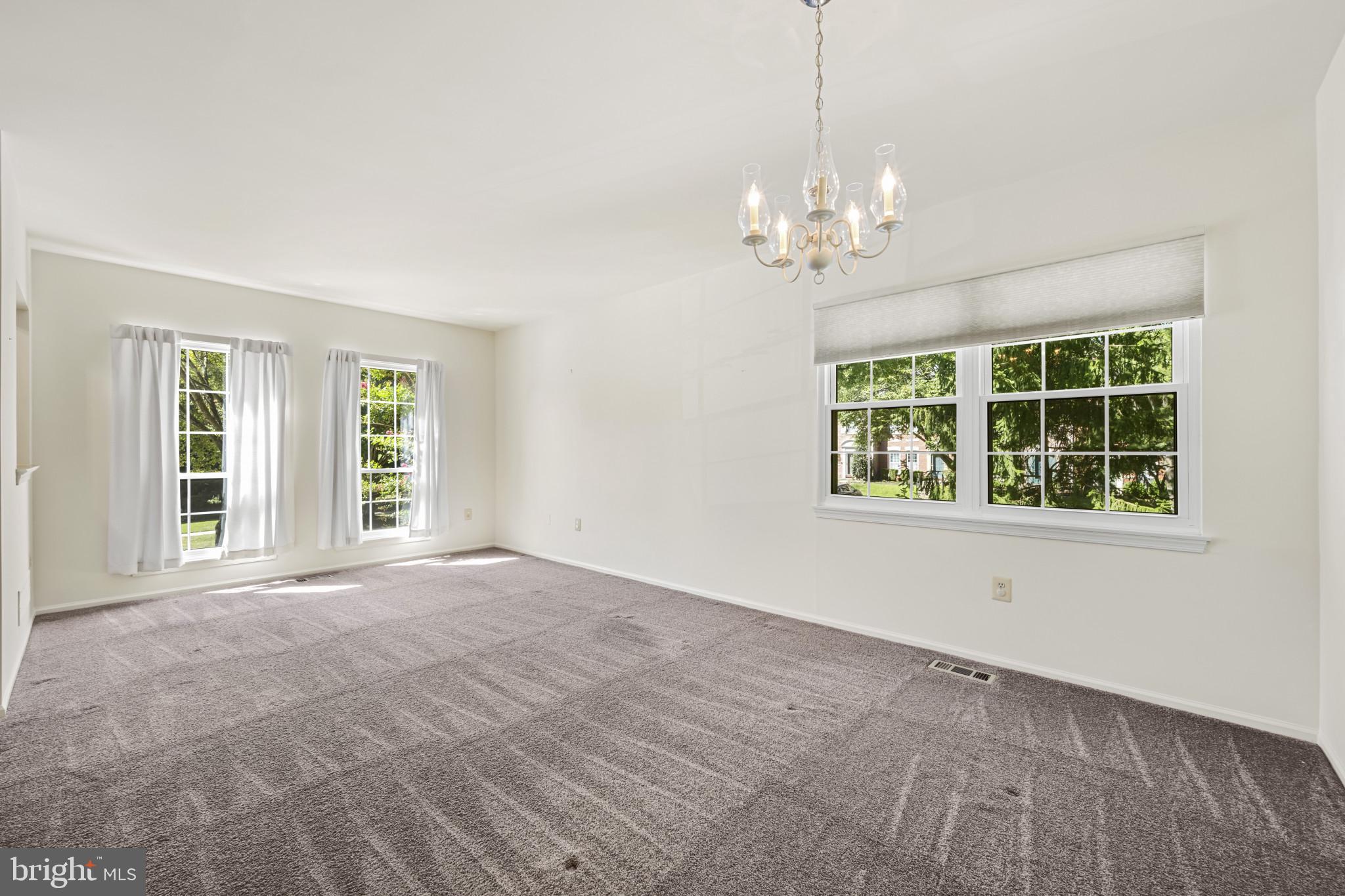4031 Forest Valley Road Baltimore, MD 21234 - Photo 4 of 30 a view of an empty room with a window