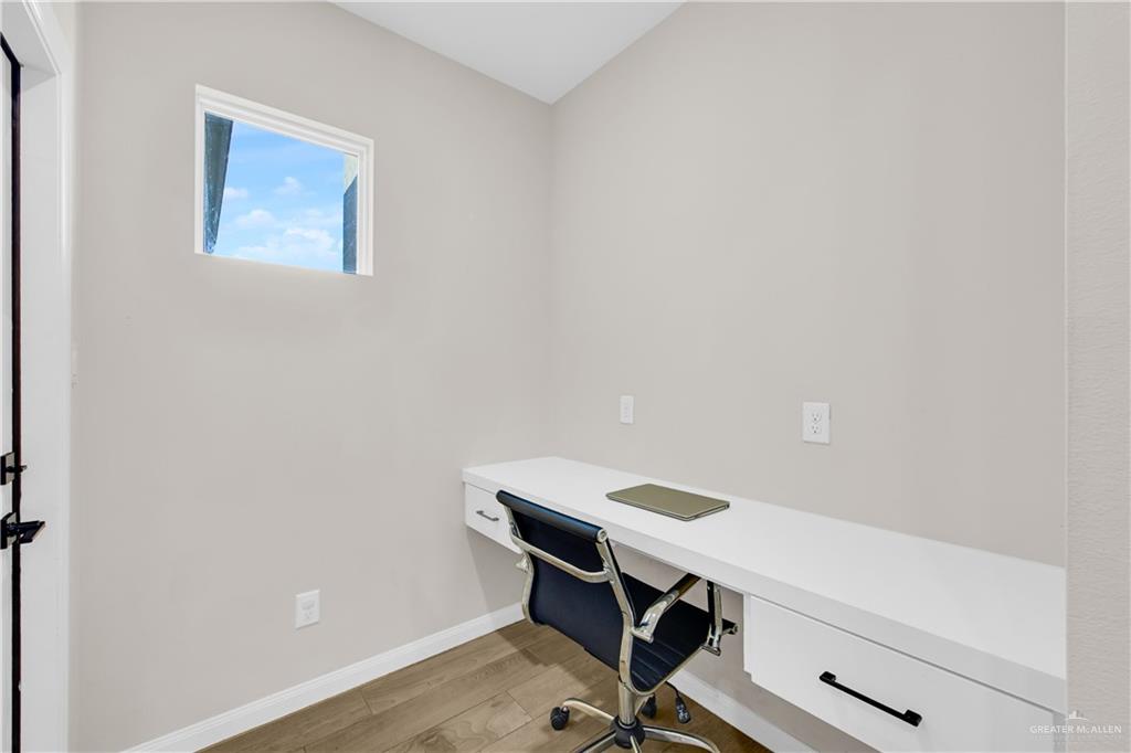 2514 Yarrow Street Mission, TX 78574 - Photo 9 of 22 Home office with light wood-style floors and built in desk