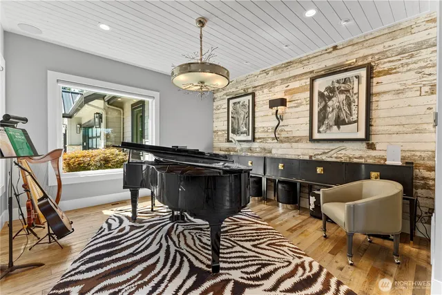 a large kitchen with a table and chairs