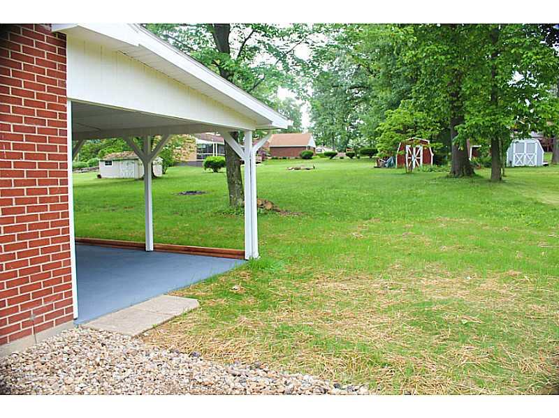 354 Old Plank Road Butler, PA 16002 - Photo 13 of 18 Exterior Back. Covered patio in rear of home. Very large level lot