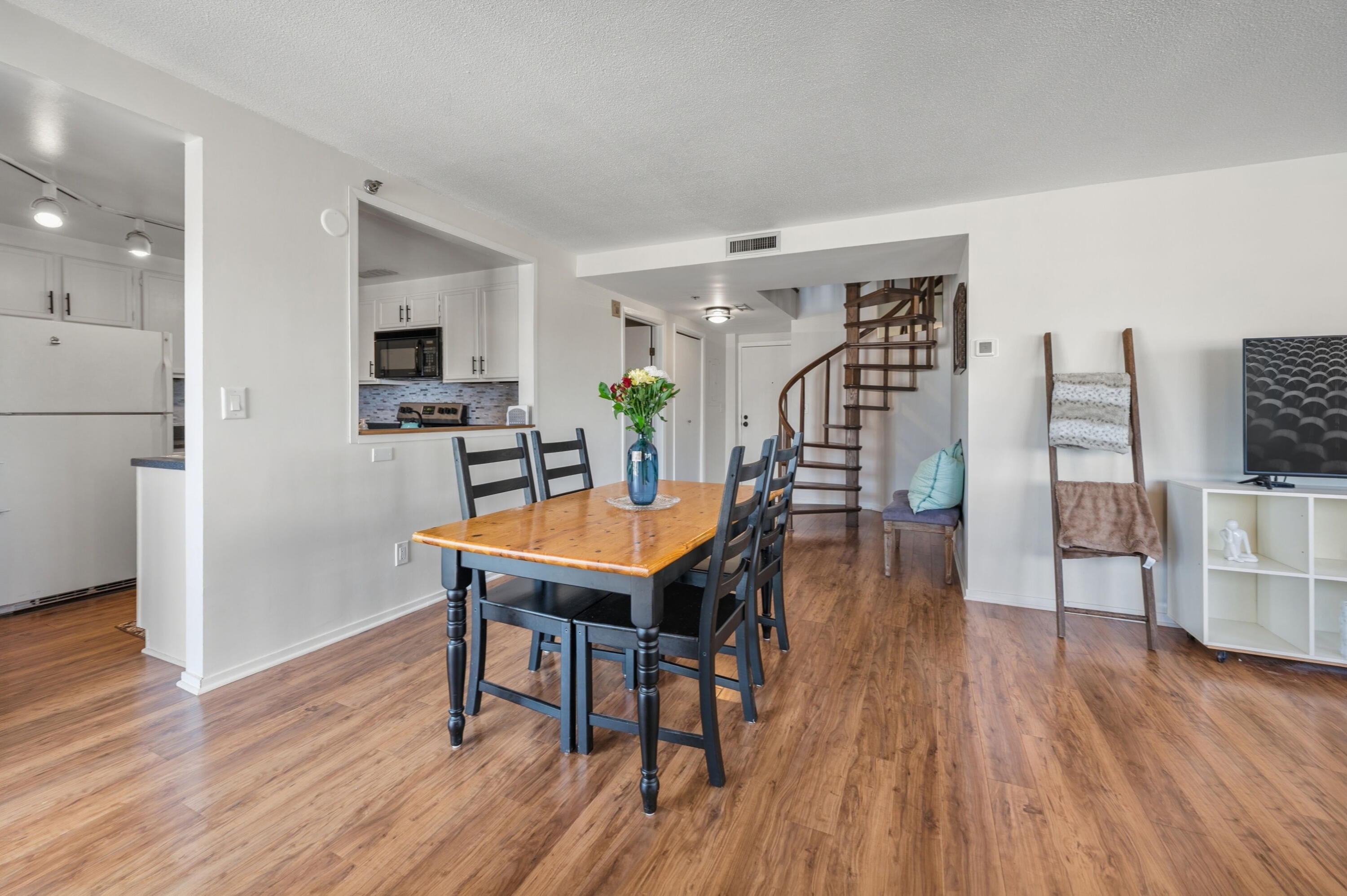1633 North Prospect Avenue, Unit 5D Milwaukee, WI 53202 - Photo 12 of 38 A practical dining setup adds definition to the open layout while keeping conversation and movement flowing naturally.