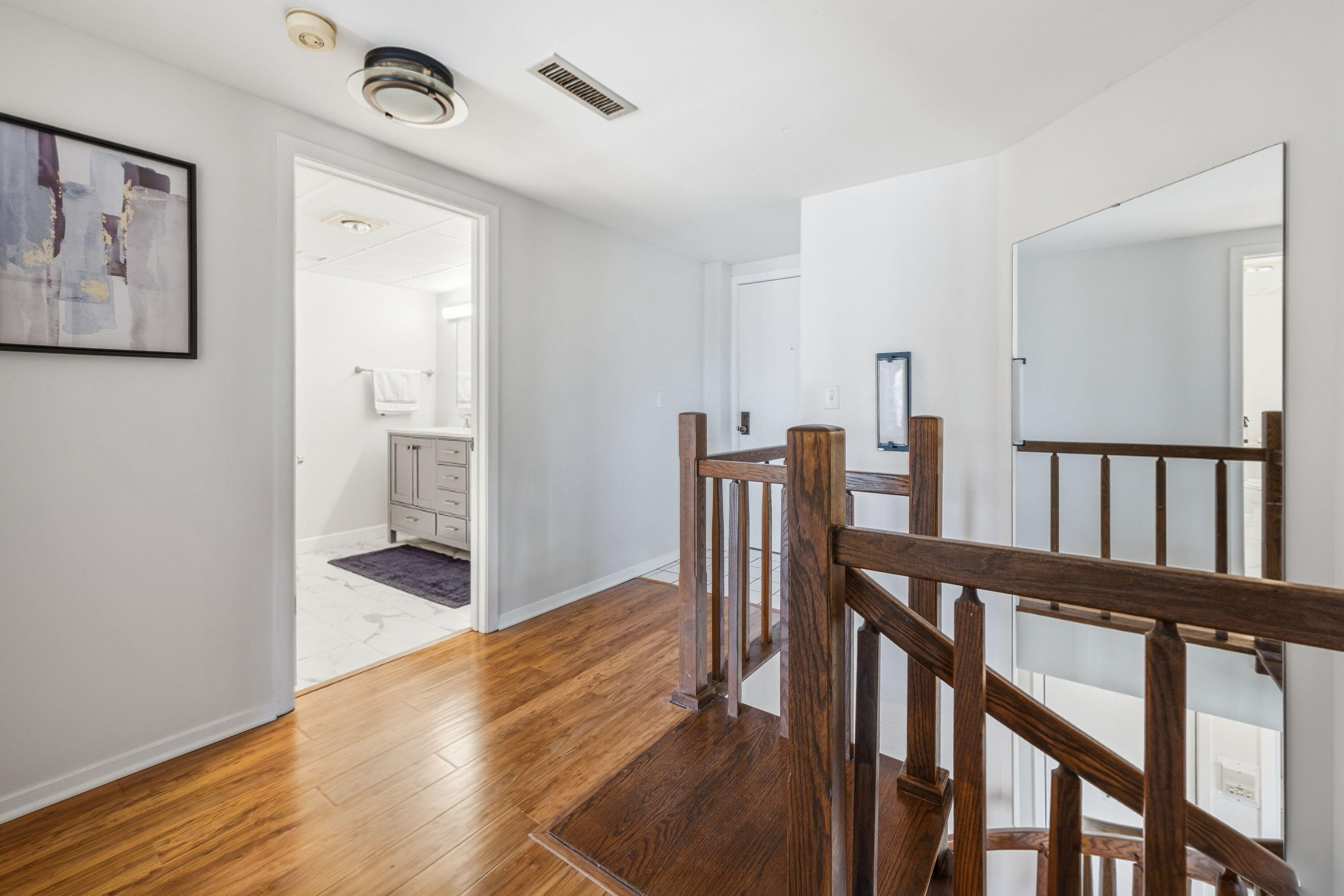 1633 North Prospect Avenue, Unit 5D Milwaukee, WI 53202 - Photo 20 of 38 The second floor keeps bedrooms and bath access separate from the main-level living spaces, adding privacy and function.
