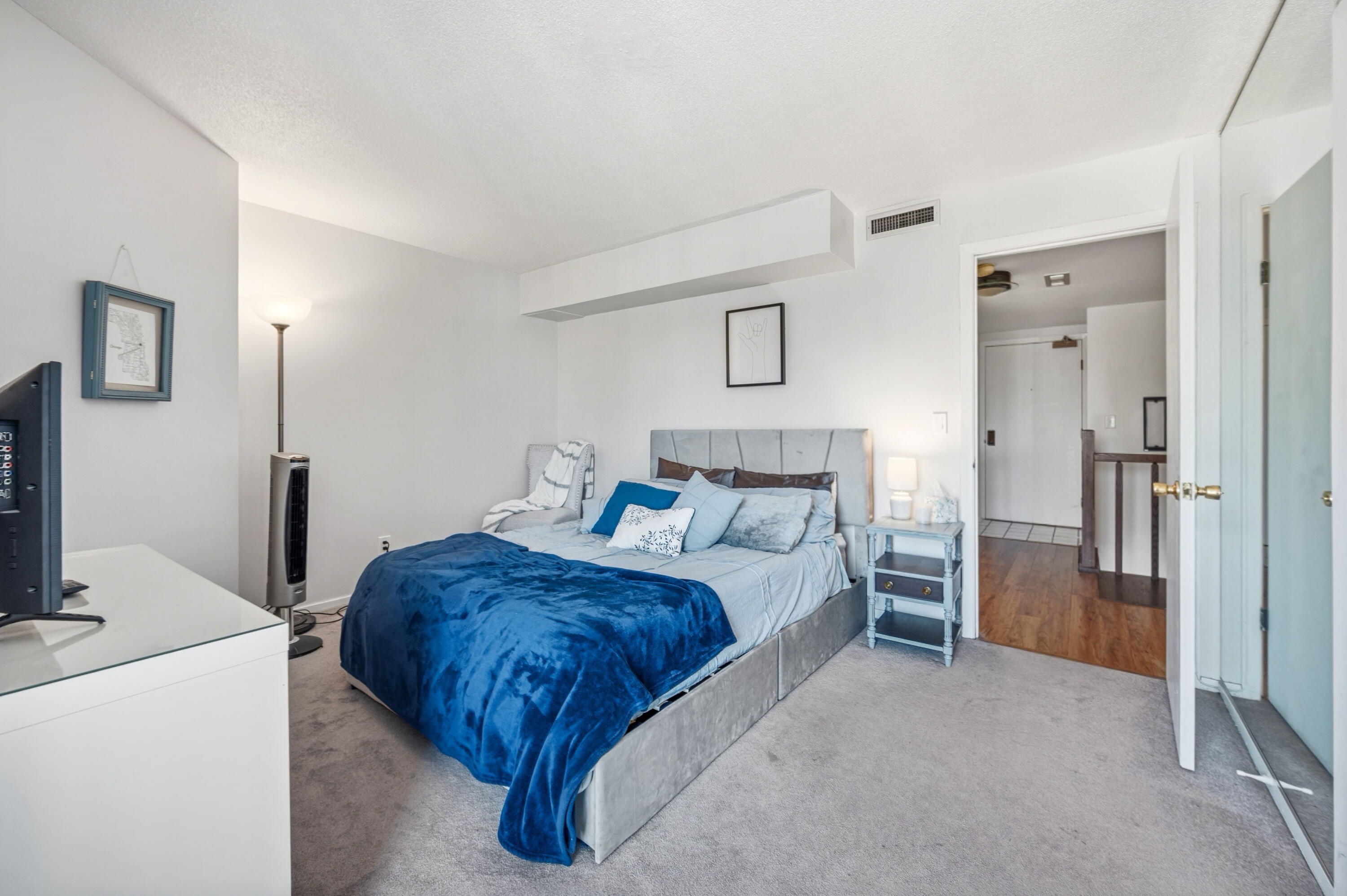 1633 North Prospect Avenue, Unit 5D Milwaukee, WI 53202 - Photo 22 of 38 A compact, easy-to-style bedroom with neutral finishes and space for the everyday essentials.