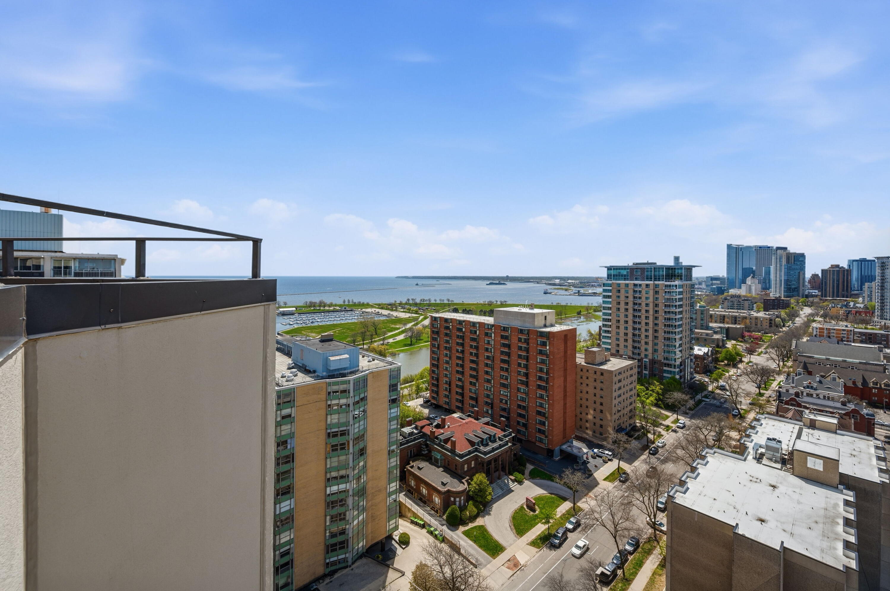 1633 North Prospect Avenue, Unit 5D Milwaukee, WI 53202 - Photo 27 of 38 From the terrace, take in a sweeping look at the East Side, Lake Michigan, and the cityscape around you.