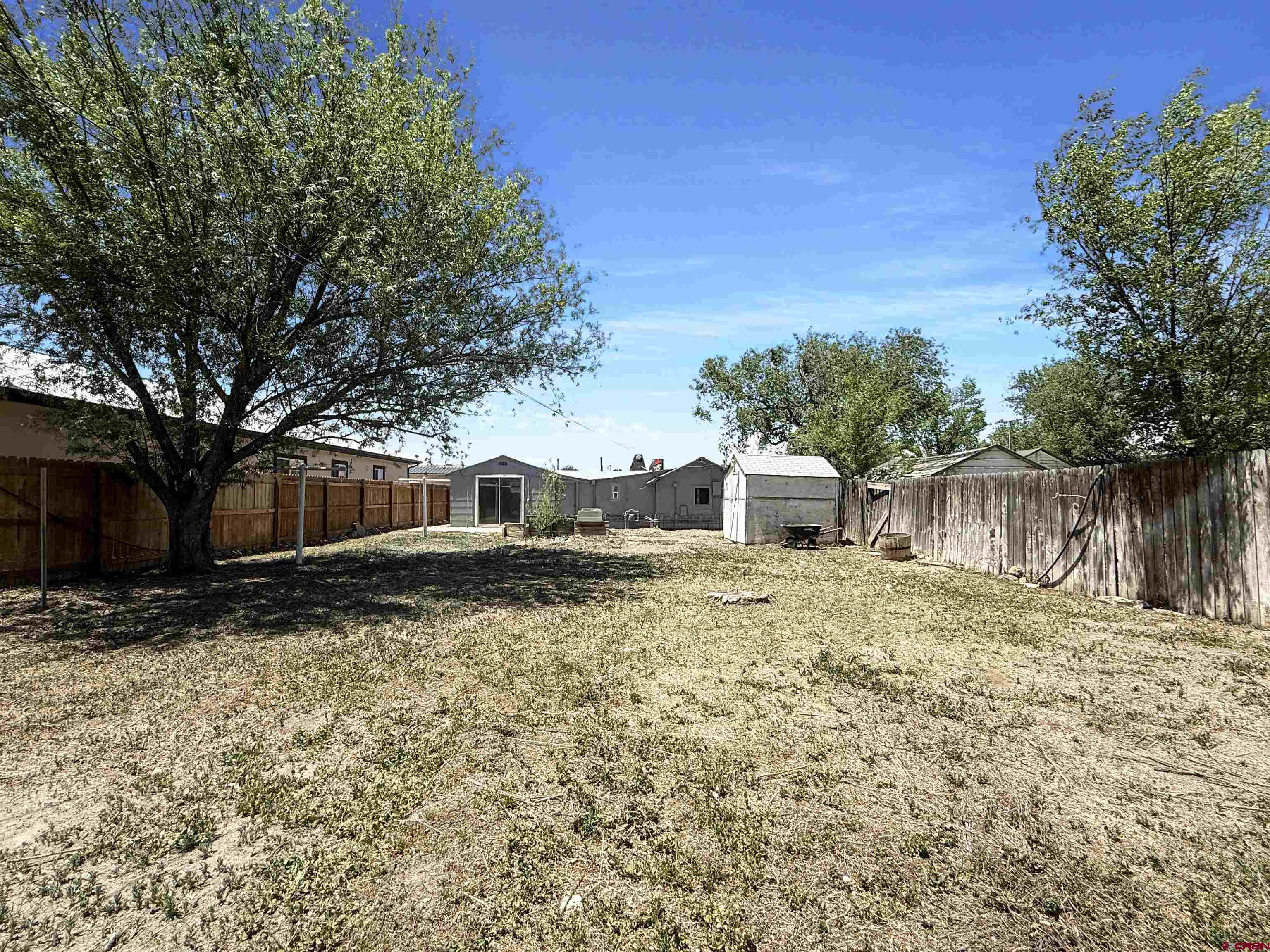 1246 Meeker Street Delta, CO 81416 - Photo 18 of 21 a backyard of a house