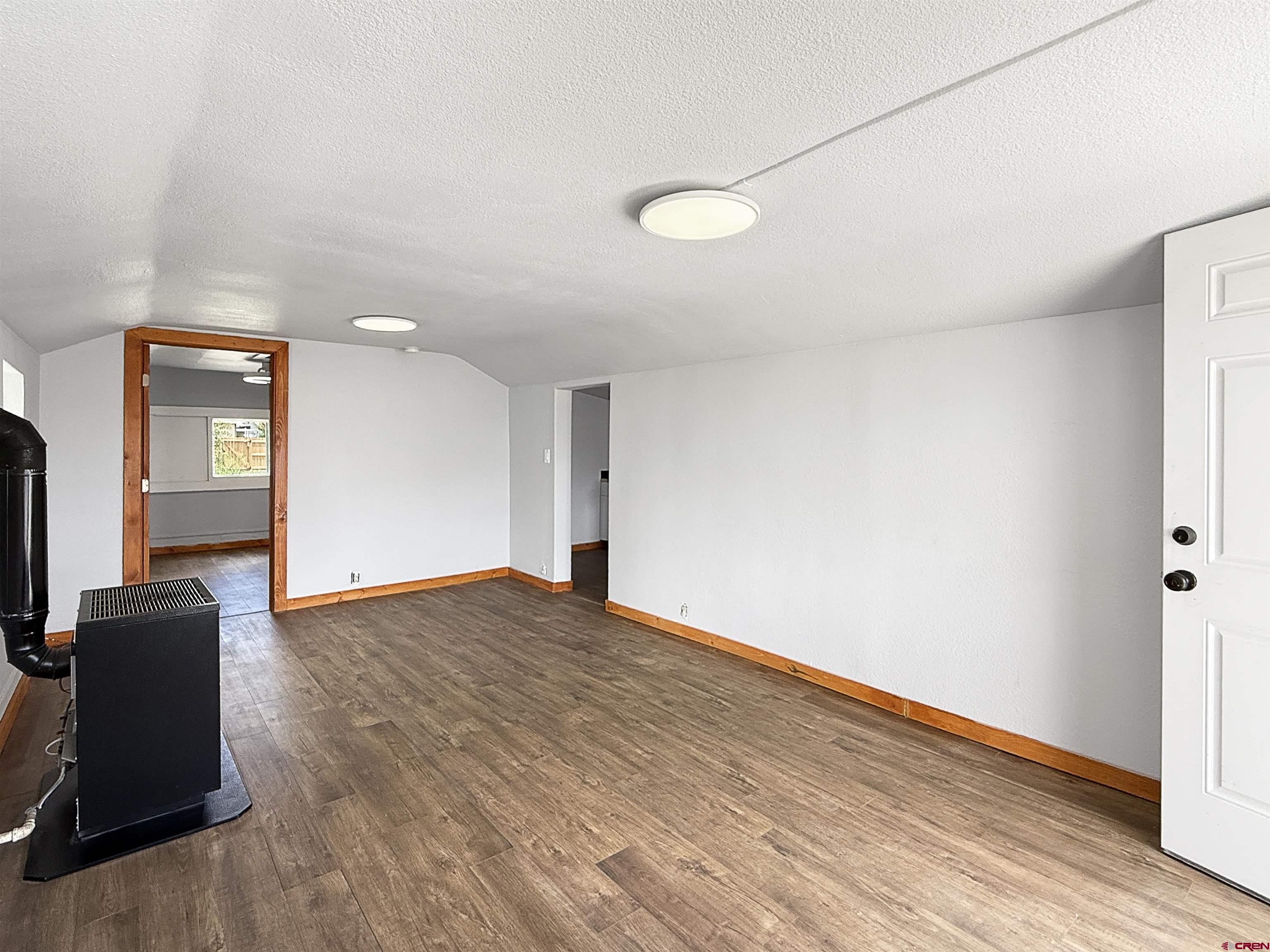 1246 Meeker Street Delta, CO 81416 - Photo 3 of 21 a view of livingroom with hardwood floor
