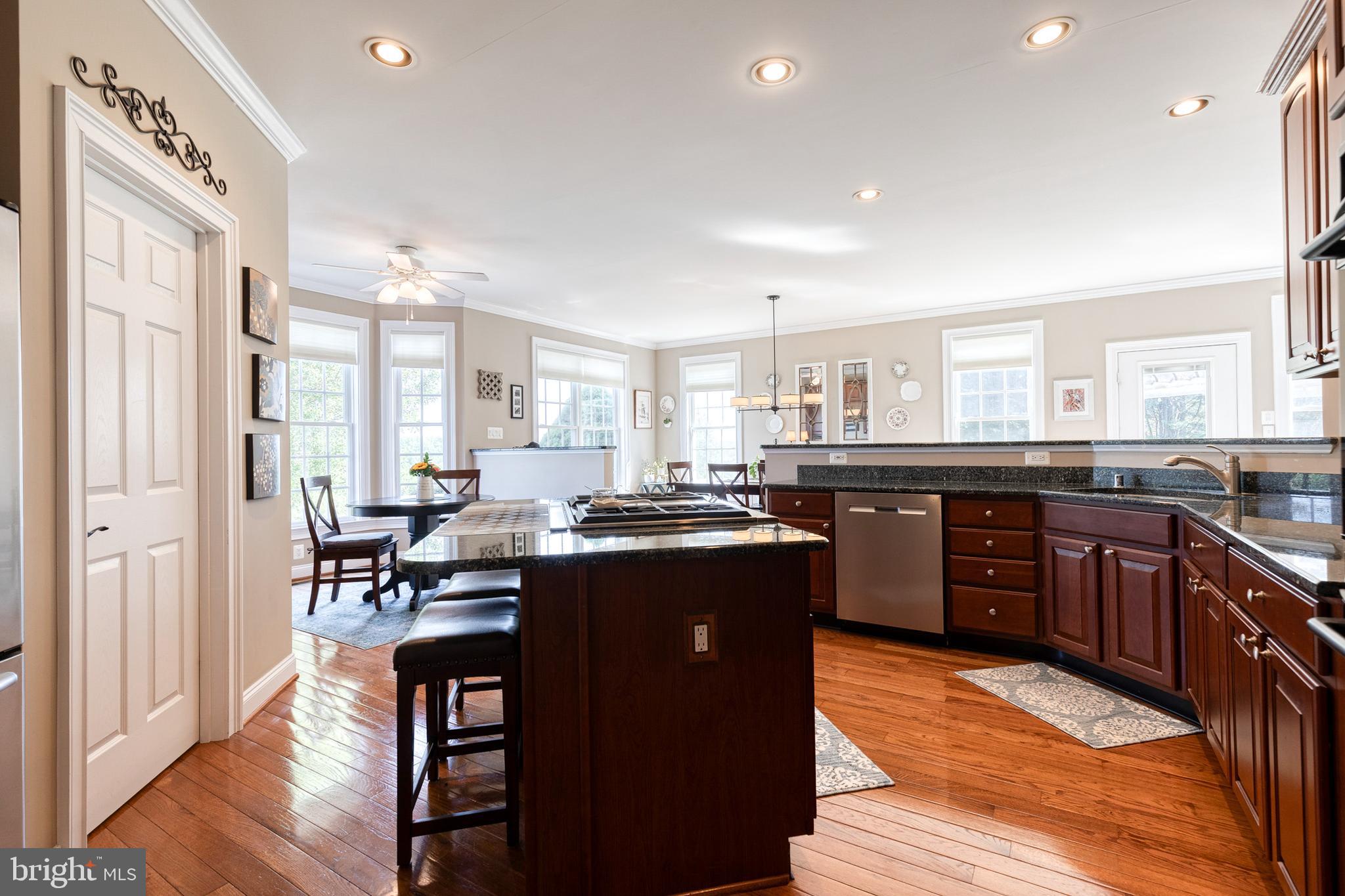 14942 Dover Road Reisterstown, MD 21136 - Photo 13 of 47 a large kitchen with lots of counter space a sink and appliances