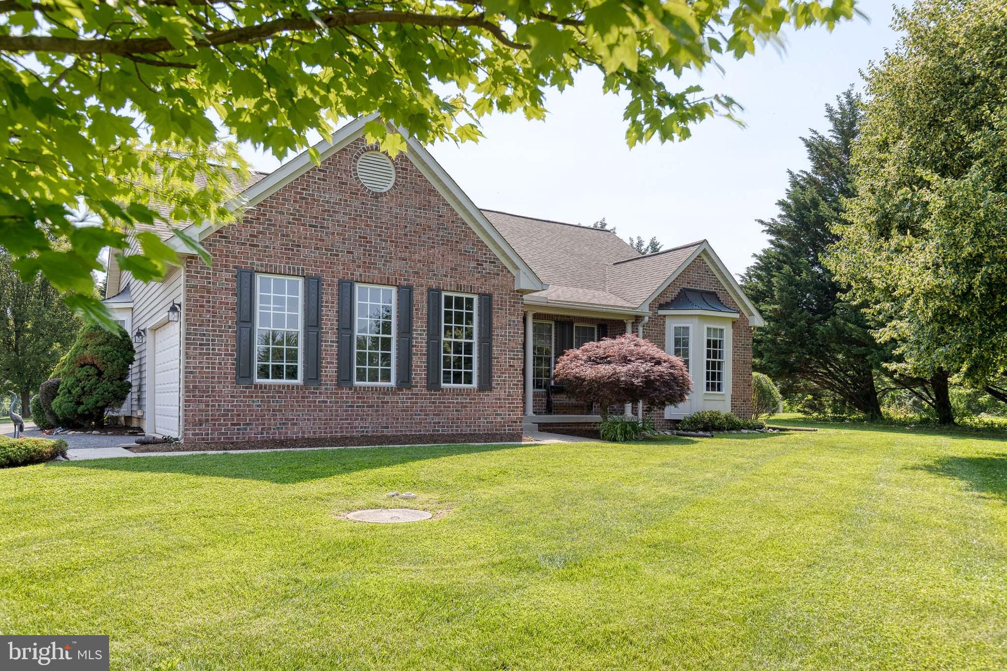 14942 Dover Road Reisterstown, MD 21136 - Photo 2 of 47 a front view of house with yard and green space