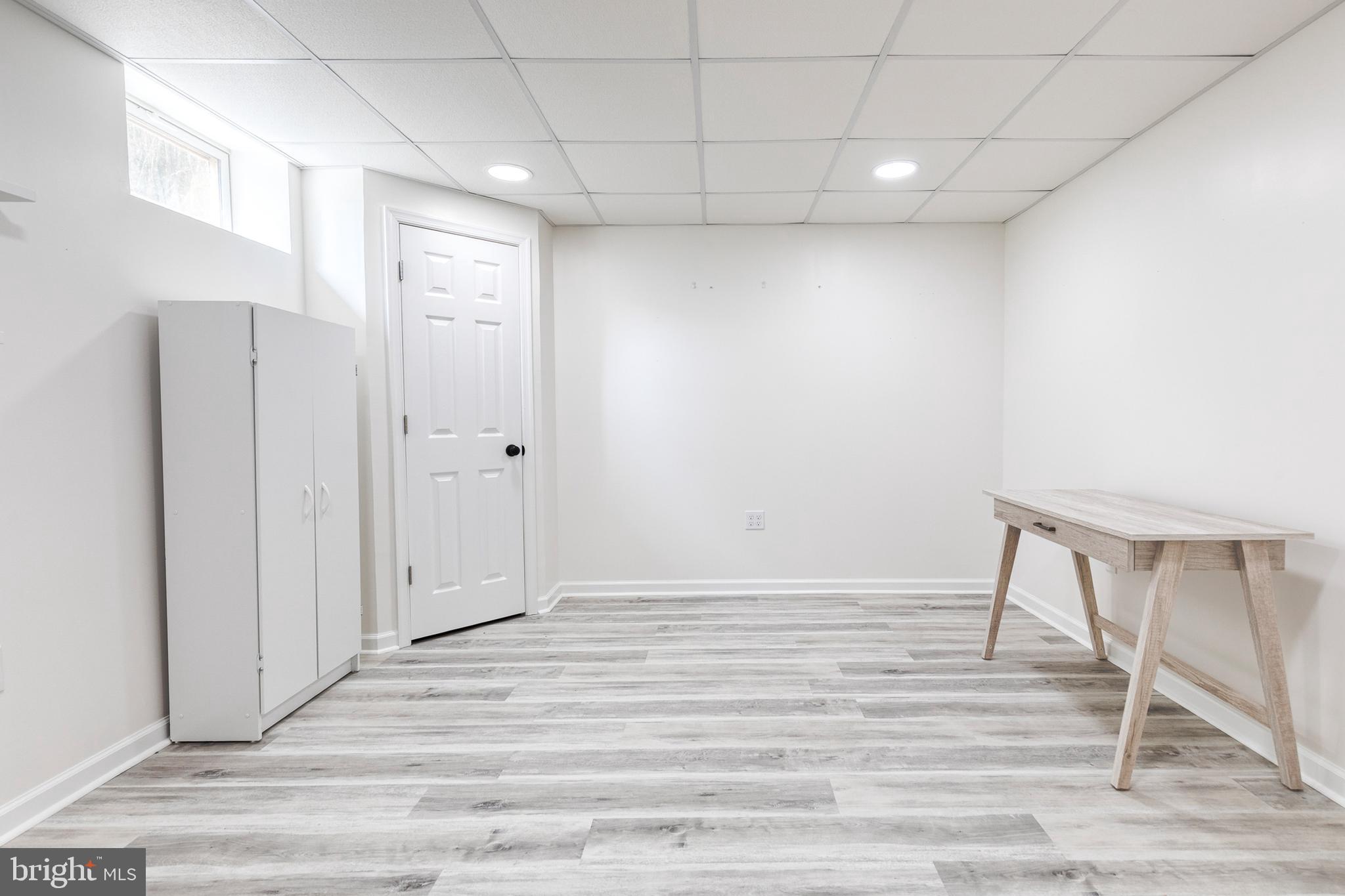 14942 Dover Road Reisterstown, MD 21136 - Photo 35 of 47 a view of room with wooden floor
