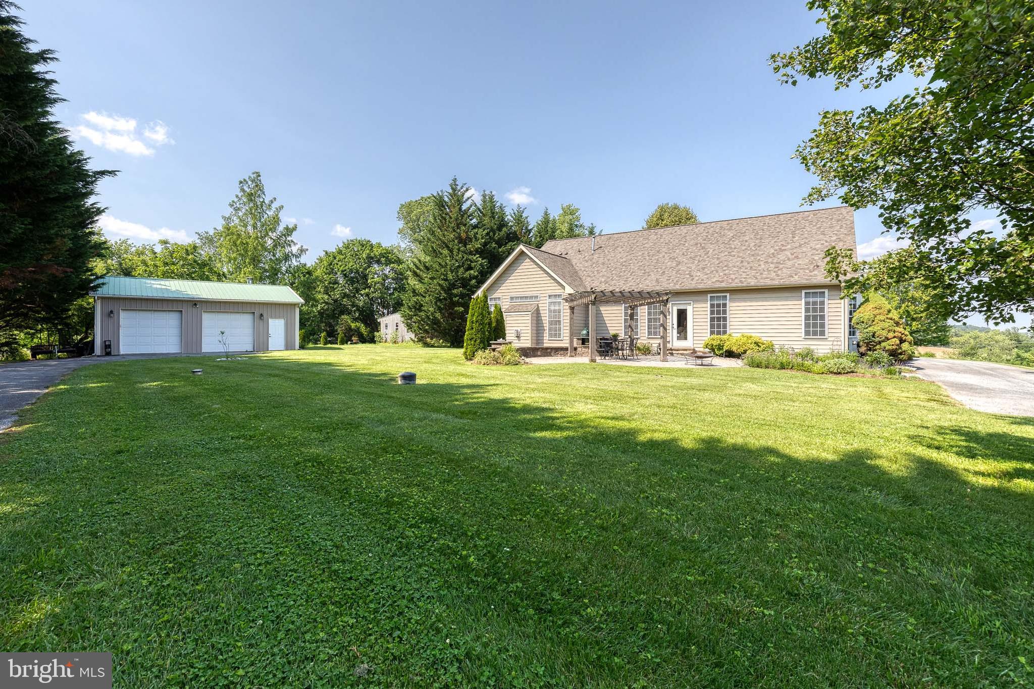 14942 Dover Road Reisterstown, MD 21136 - Photo 36 of 47 a house view with a garden space