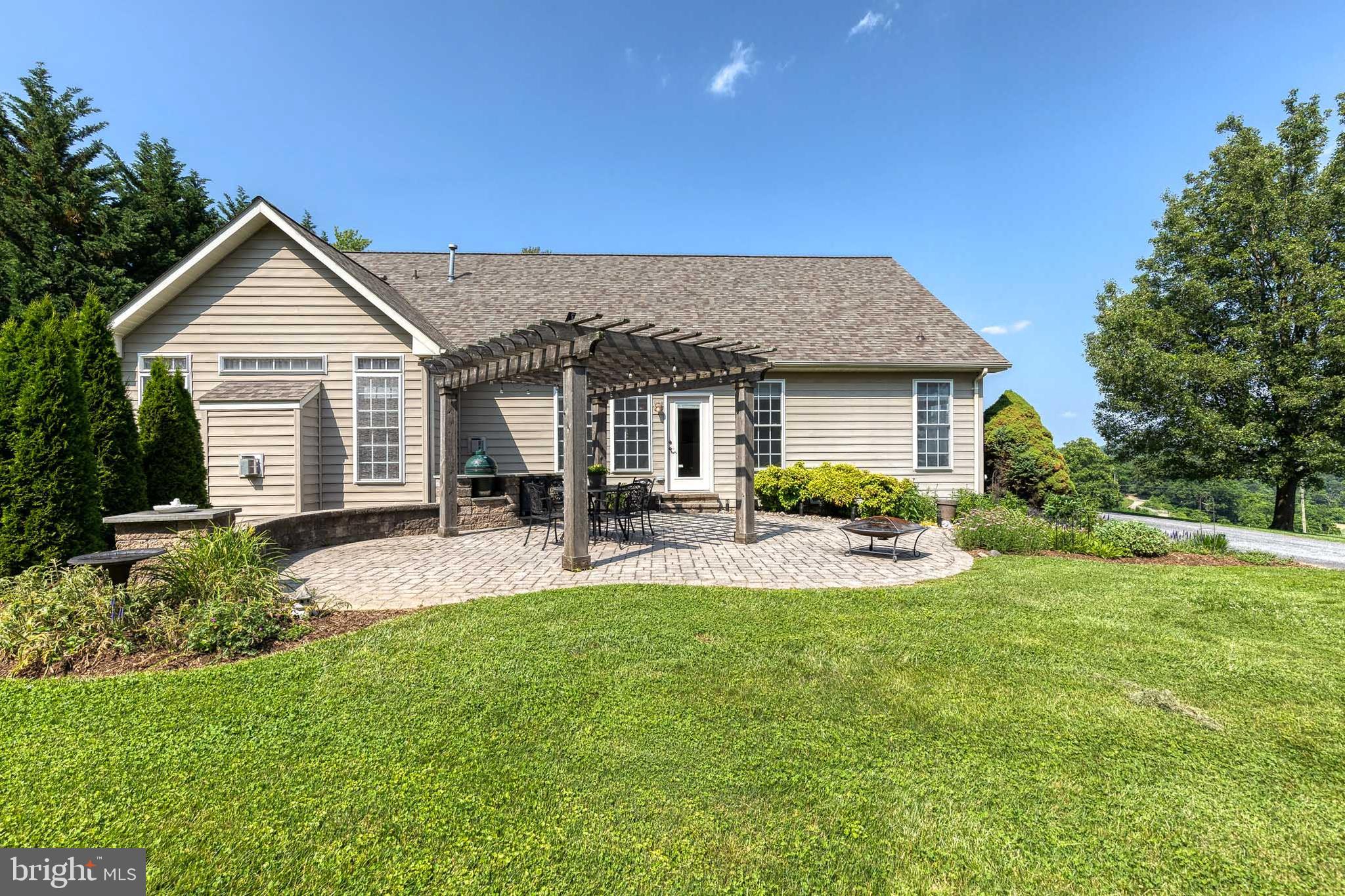 14942 Dover Road Reisterstown, MD 21136 - Photo 40 of 47 a front view of house with yard and green space