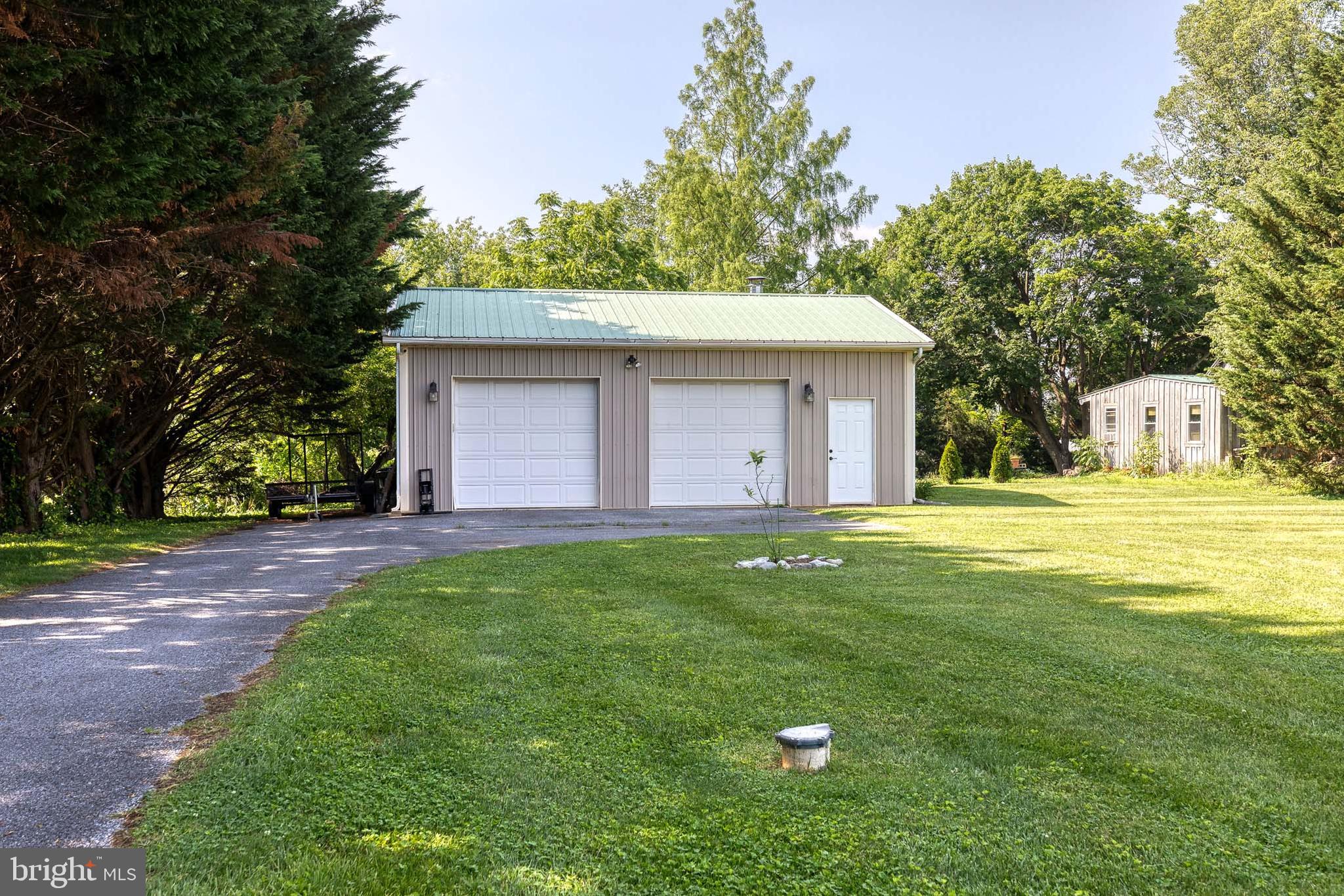 14942 Dover Road Reisterstown, MD 21136 - Photo 46 of 47 a view of a house with a yard