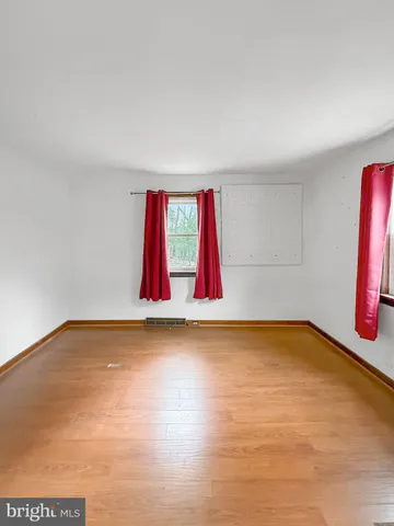 a view of a room with natural light