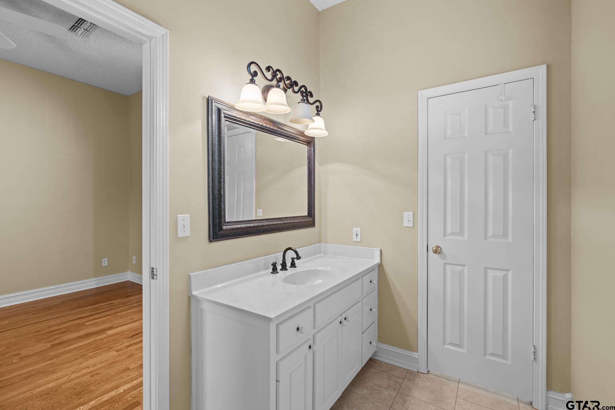 210 Lavender Lane Longview, TX 75605 - Photo 20 of 36 a view of bathroom with dual sinks