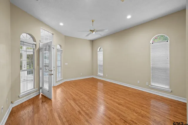 a bathroom with a double vanity sink and mirror