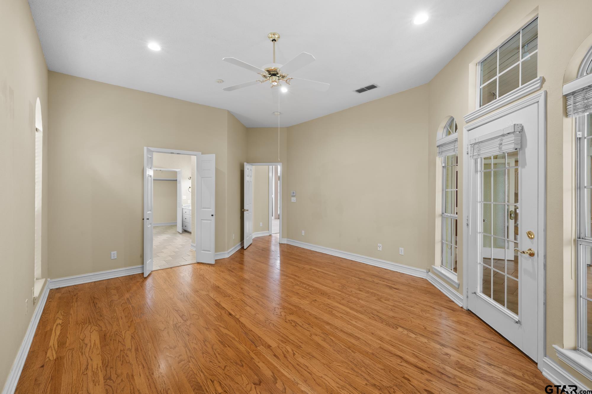 210 Lavender Lane Longview, TX 75605 - Photo 22 of 36 a view of an empty room with wooden floor