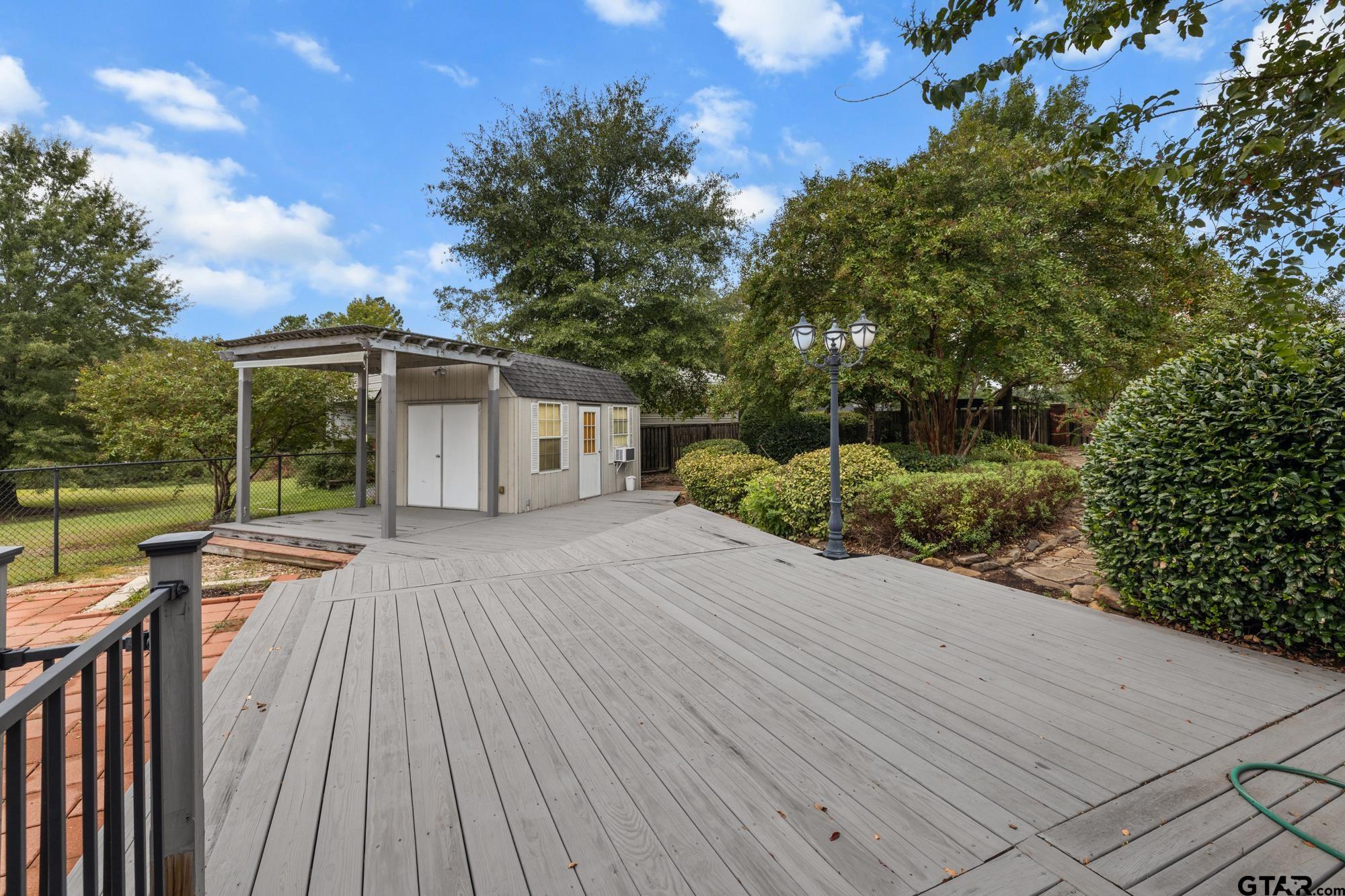 210 Lavender Lane Longview, TX 75605 - Photo 31 of 36 a view of house with backyard and outdoor seating