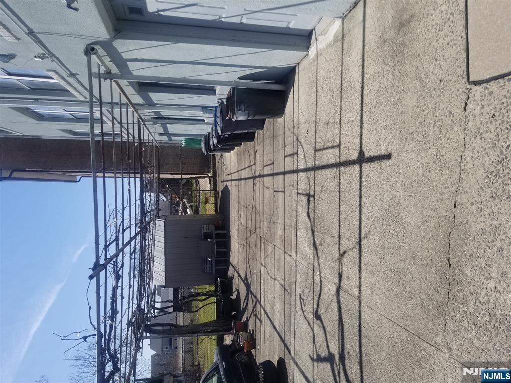 130-2 Rutherford Place, Unit 2L North Arlington, NJ 07031 - Photo 10 of 11 a view of a garage with furniture