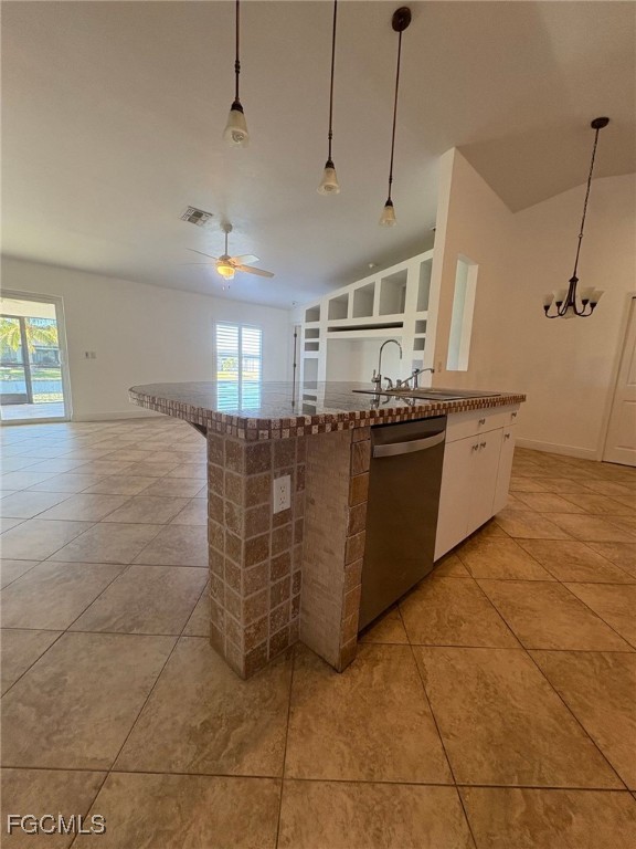 1502 Southwest 20th Avenue Cape Coral, FL 33991 - Photo 11 of 31 a kitchen with stainless steel appliances granite countertop a sink and cabinets