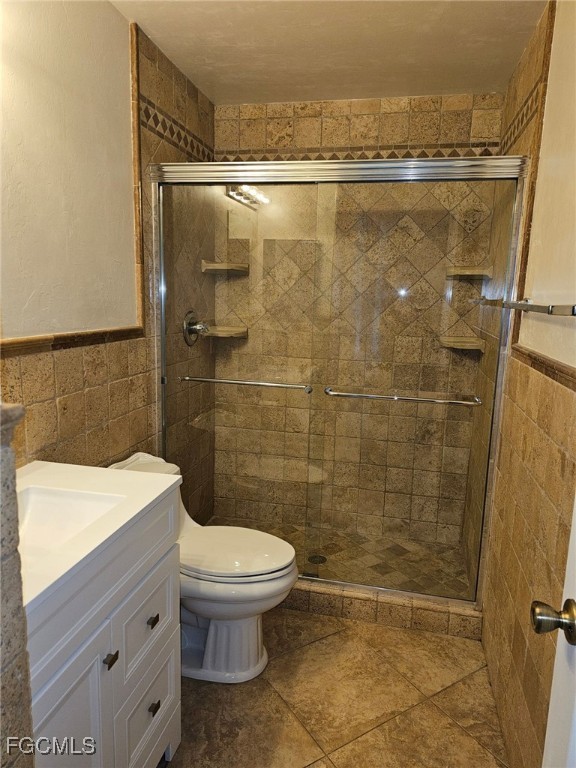 1502 Southwest 20th Avenue Cape Coral, FL 33991 - Photo 24 of 31 a bathroom with a shower a toilet and a sink