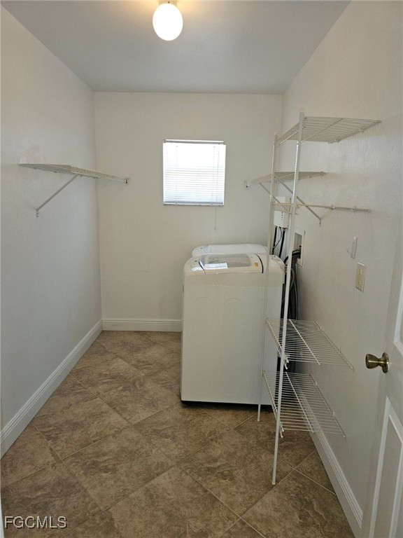 1502 Southwest 20th Avenue Cape Coral, FL 33991 - Photo 25 of 31 a utility room with dryer and washer