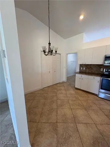 a view of a kitchen with a sink