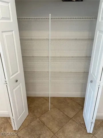 a view of a room with an empty space