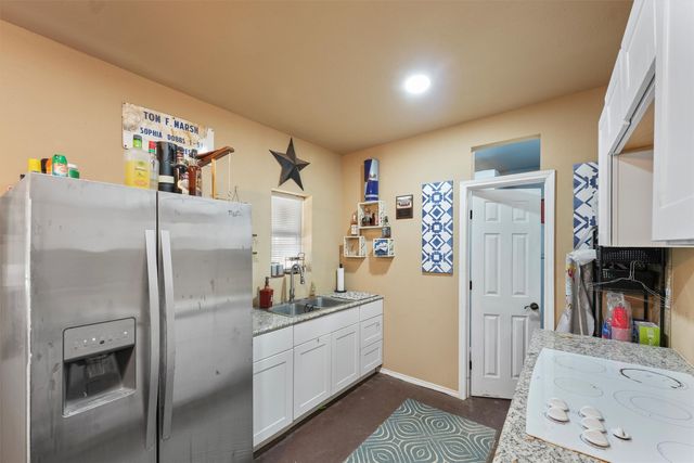 a view of a workspace with furniture