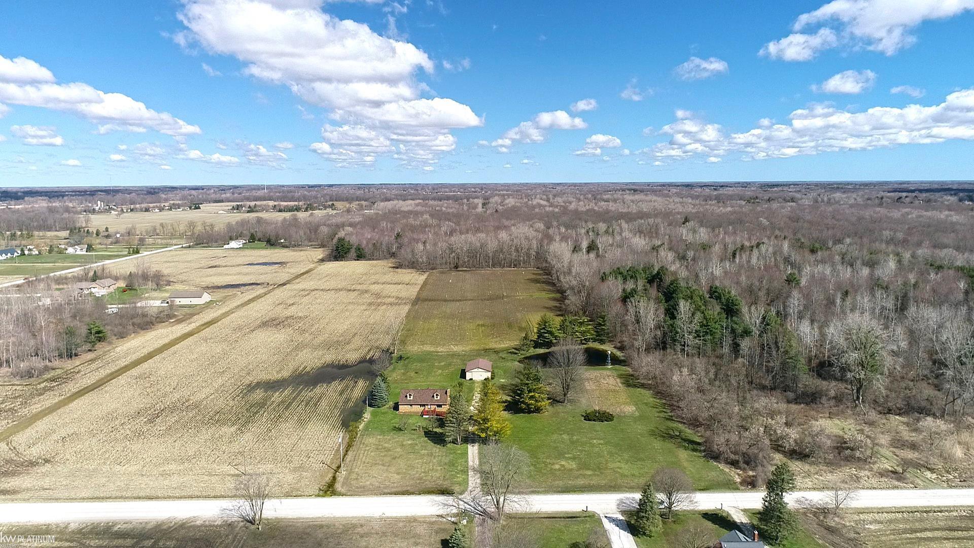 9880 Puttygut Road Casco, MI 48064 - Photo 4 of 64 50138182-f16c0478-17e4-404c-813a-21d8ee1f59ae.JPG